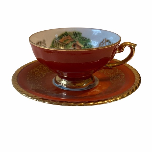 Vintage German burnt orange 24k plates gold teacup and saucer set